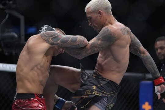 Charles Oliveira and Dustin Poirier fighting